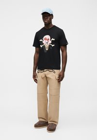 Icecream Spray Paint Running Dog Pants
