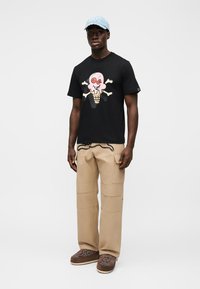 Icecream Spray Paint Running Dog Pants