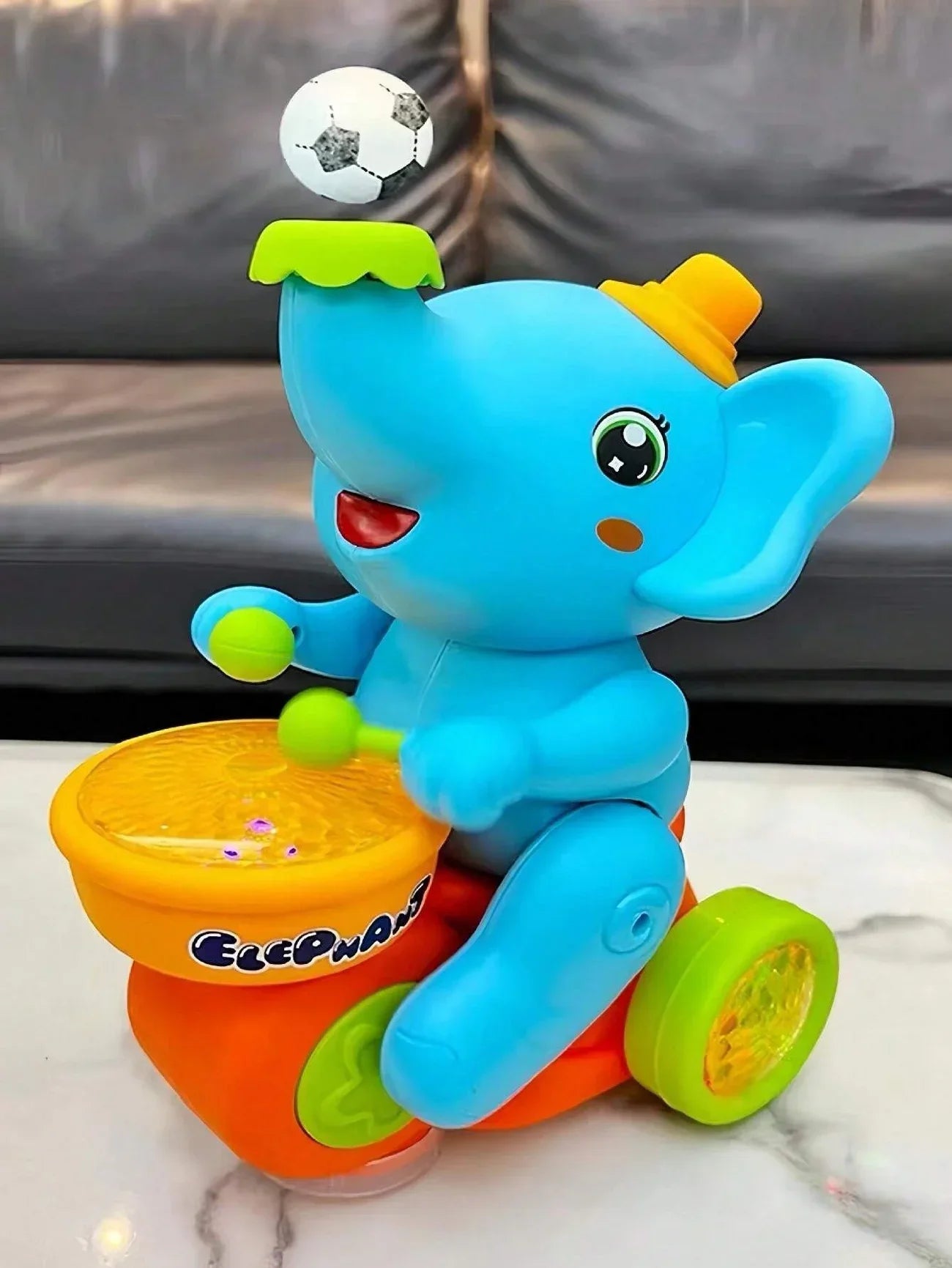 Giocattolo elefante musicale: ballo e tamburo